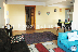 RE-CG: Sala y vista de pasillo hacia habitaciones