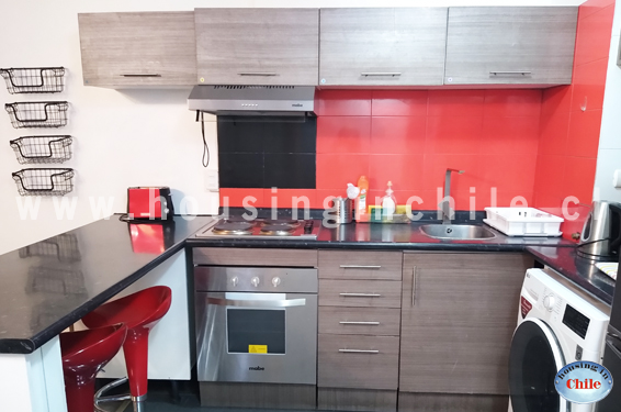 Lavadora de ropa en el departamento