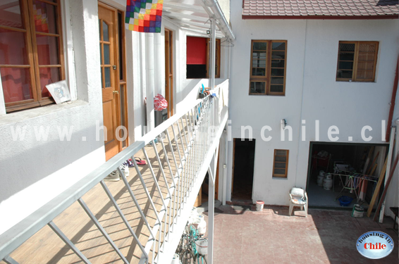 RE-AR: Corridor of rooms with view to the patio